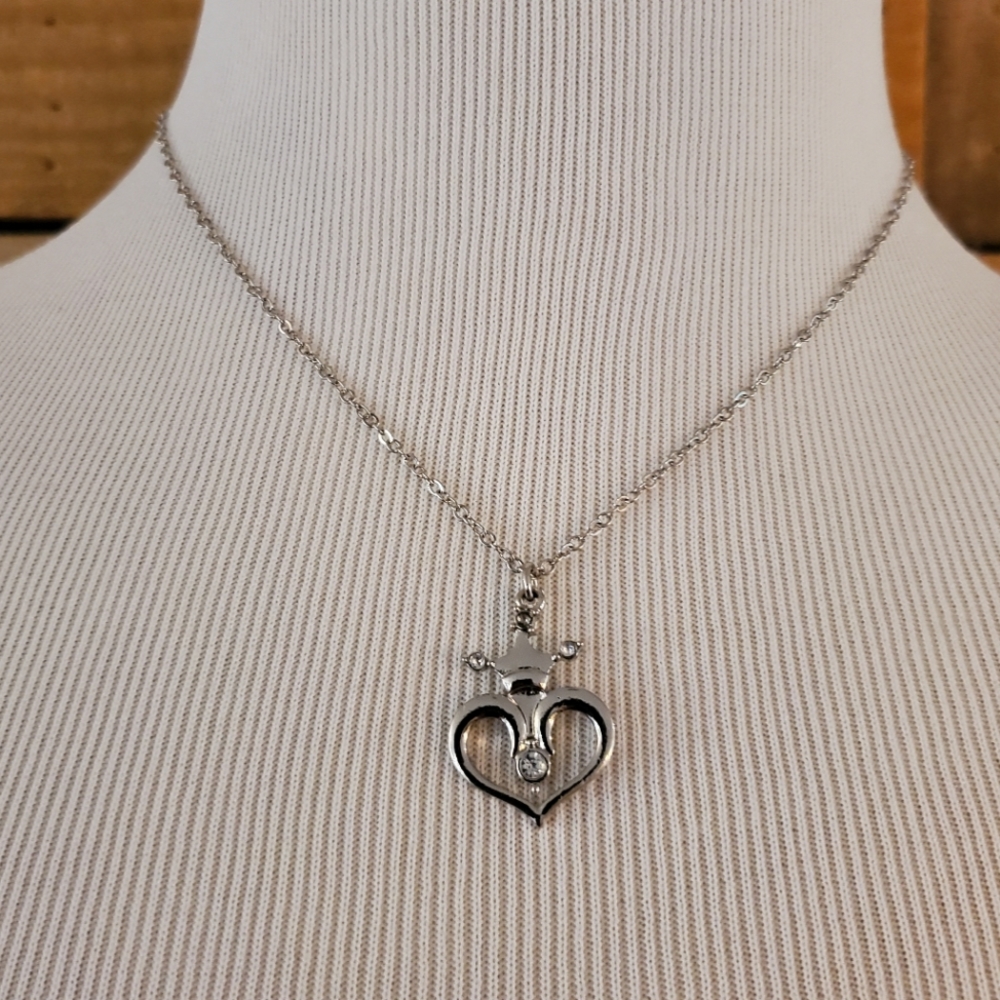 Silvertone open heart necklace w/ crown & rhinestones